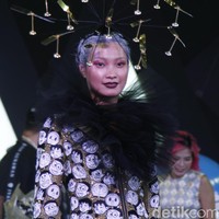 Karakter Doraemon mengajarkan kebaikan, jadi saya juga ingin menyebar kebaikan. Semoga kalau ada yang beli, langsung akan kita sumbangkan, jelasnya. Foto: Mohammad Abduh/Wolipop