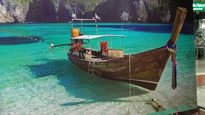 Banner Raja Ampat yang salah di T2 Soekarno Hatta (@ikrargilang/Twitter) Banner Raja Ampat yang salah di T2 Soekarno Hatta (@ikrargilang/Twitter)
