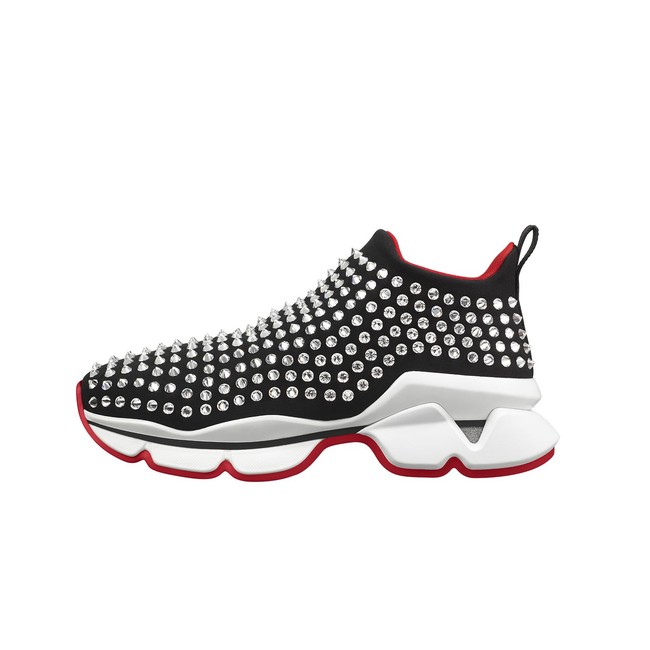 Koleksi dari Run Loubi Run termasuk Krystal Sock Donna yang dihiasi stud yang berkilauan pada bagian bodinya. Sneakers tanpa tali ini hadir dalam warna hitam dan merah. (Foto: Dok. Christian Louboutin)