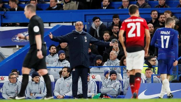 Maurizio Sarri mengaku iri dengan Pep Guardiola.