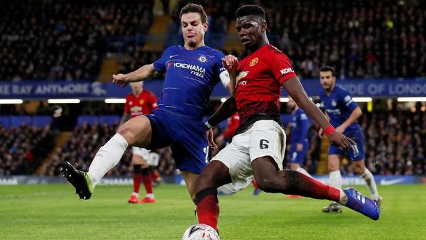Paul Pogba mencetak satu gol saat melawan Chelsea.
