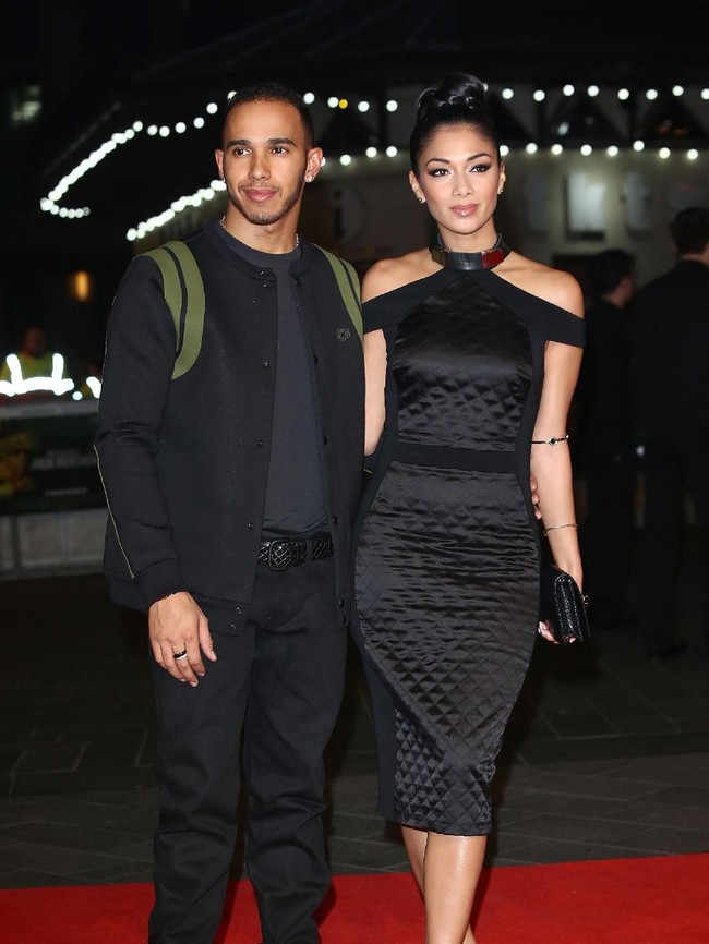 Hubungan percintaan Lewis Hamilton dan Nicole sendiri dikabarkan kandas karena LDR atau jalinan cinta jarak jauh yang harus mereka lalui. Namun ada juga kabar yang menyebutkan mereka putus karena Lewis tak kunjung menikahi wanita 40 tahun itu. Foto: dok. Getty Images