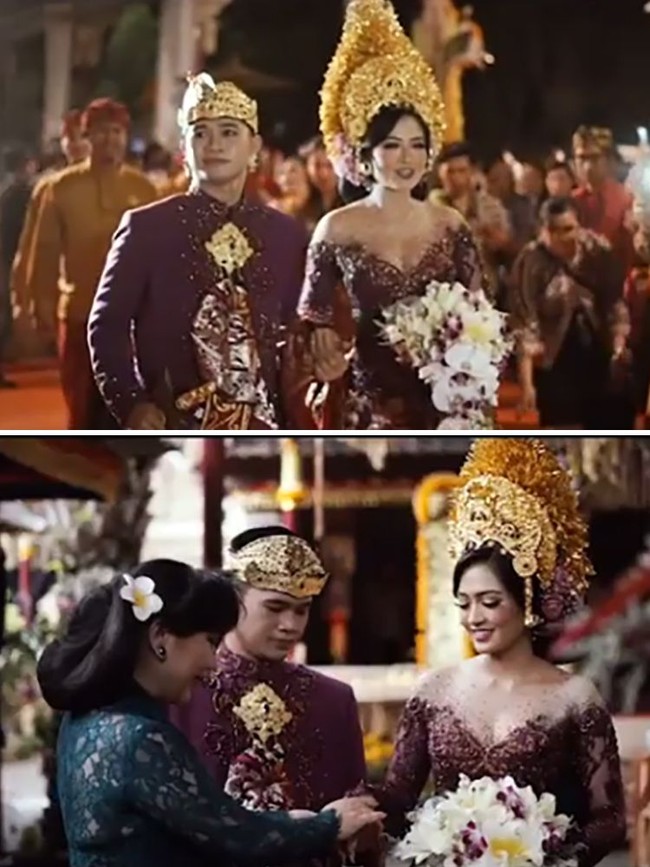 Anne Avantie membantu mempelai wanita memakai kebaya rancangannya yang berwarna merah marun. Kebaya off shoulder yang dipakai mempelai wanita Anastasia Phanasta begitu megah dengan detail ekor yang panjangnya hingga menyapu lantai.  Foto: Dok. Anne Avantie