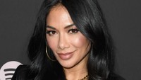 Nicole Scherzinger pun juga punya kesibukan lain sebagai model, penulis lagu, dan juga aktris. (dok. Getty Images)