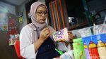 Keren! Wanita Ini Sulap Kaleng Bekas Jadi Cantik dan Berharga