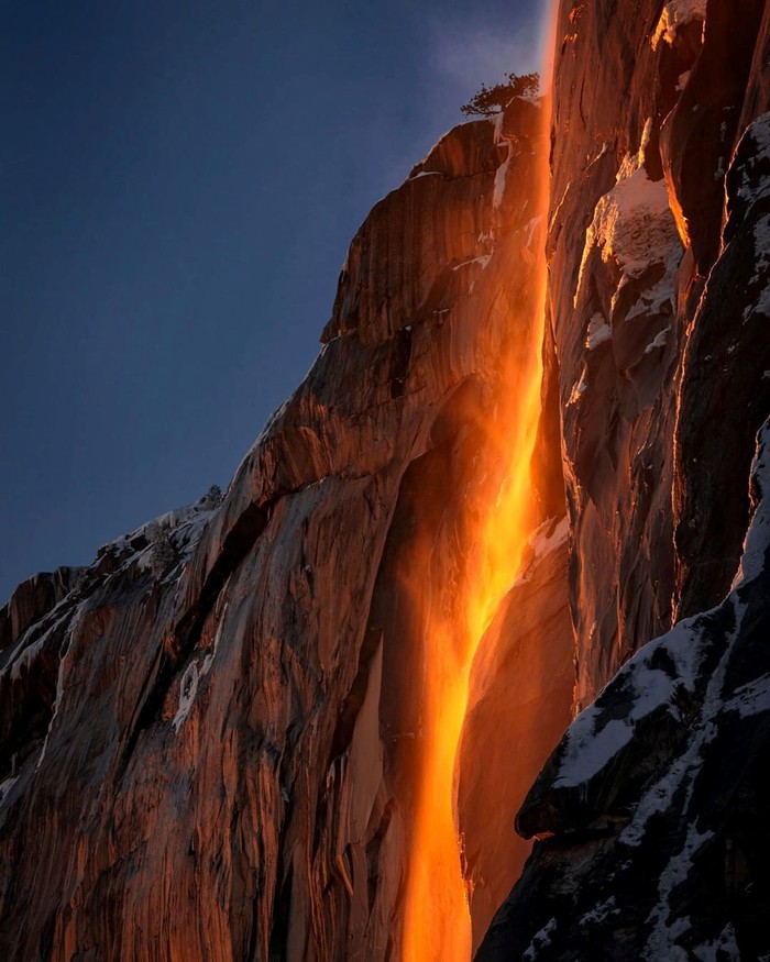 Sunlight hits the Horesetail Fall, turning it into a 