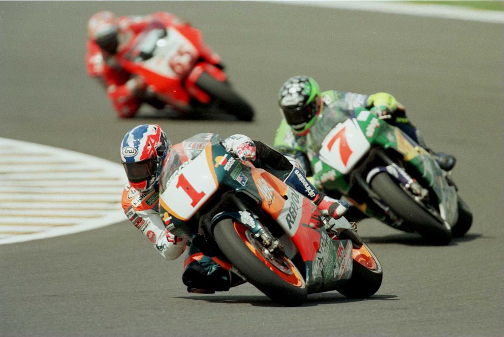 7 Apr 1996:  World Champion Mick Doohan leads second place rider Alex Barros and third Loris Capirossi at the 500cc Indonesian Motorcycle Grand Prix at Sentul, Jakarta.  Mandatory Credit: Mike Cooper/ALLSPORT