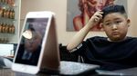 Sambut Pertemuan Korut-AS, Bocah Ini Tiru Gaya Rambut Kim Jong Un