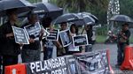 Diguyur Hujan, Aksi Kamisan ke-575 Digelar di Depan Istana