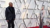 Brie Larson dan Samuel L Jackson saat hadir di Oscar 2019 di California, Amerika Serikat pada Minggu (24/2). Frazer Harrison/Getty Images