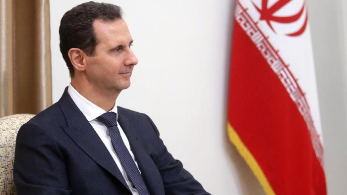 In this photo released by an official website of the office of the Iranian supreme leader, Supreme Leader Ayatollah Ali Khamenei speaks with Syrian President Bashar Assad during their meeting in Tehran, Iran, Monday, Feb. 25, 2019. Syrian state-run media say President Bashar Assad has visited Iran and met with officials there on a rare trip abroad. SANA said Assad met with Supreme Leader Ayatollah Ali Khamenei and President Hassan Rouhani on the trip â€” the first time he has traveled anywhere other than Russia since the Syrian civil war erupted nearly eight years ago. (Office of the Iranian Supreme Leader via AP)
