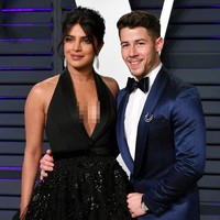 Nick Jonas dan Priyanka Chopra menjadi bagian dari kemeriahan dari after-party Oscars 2019 yang digelar oleh majalah Vanity Fair, Minggu (24/2/2019). Ini adalah pesta Oscars pertama mereka setelah resmi menjadi suami-istri pada Desember 2018. (Foto: Getty Images)