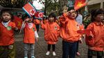 Cerianya Anak-anak TK di Vietnam Sambut Kedatangan Kim Jong Un