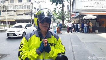 Saat ini kendala bahasa masih menjadi isu bagi orang asing yang ingin memesan layanan Get. Foto: Virgina Maulita Putri