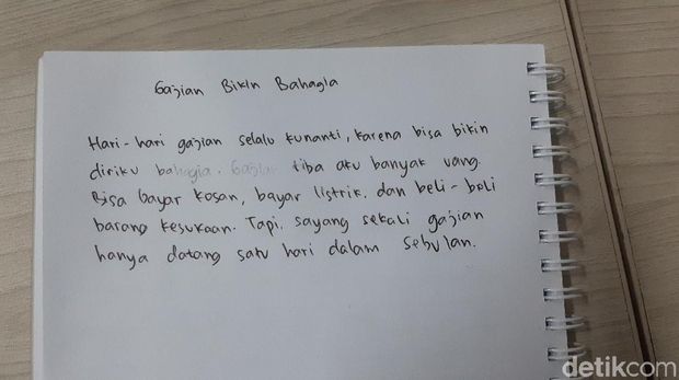 Contoh tulisan tangan Anggi.