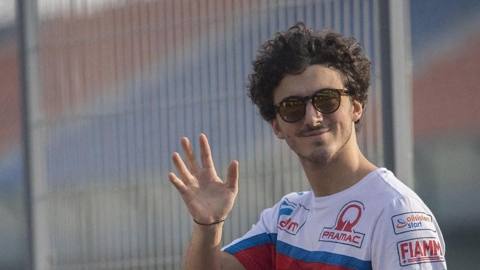 francesco bagnaia alma pramac racing ducati motogp 2019 qatar DOHA, QATAR - FEBRUARY 25: Francesco Bagnaia of Italy and Alma Pramac Racing greets and smiles in pit during the MotoGP Tests - Day Three at Losail Circuit on February 25, 2019 in Doha, Qatar. (Photo by Mirco Lazzari gp/Getty Images)