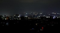 Suasana gelap menyelimuti Kota Caracas, Venezuela, Kamis (7/3). REUTERS/Manaure Quintero.