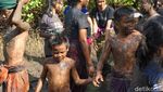 Potret Tradisi Mandi Lumpur di Bali