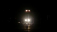 Warga menyeberangi jalan dengan penerangan dari lampu mobil. REUTERS/Carlos Garcia Rawlins.