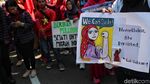 Potret Aksi Hari Perempuan di Kawasan Monas