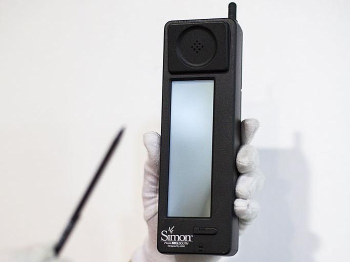 LONDON, ENGLAND - AUGUST 15:  An original IBM Simon Personal Communicator is handled by a member of staff at the Science Museum on August 15, 2014 in London, England. Saturday, August 16 marks the 20th anniversary of the worlds first smart phone, the IBM Simon, going on public sale.  The device will be showcased as part of The Science Museums Information Age exhibition, which opens on October 25th.  (Photo by Rob Stothard/Getty Images)