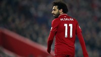 Di Liverpool, Salah bernomor punggung 11 dan berhasil mencetak 28 gol di seluruh kompetisi musim ini. Clive Brunskill/Getty Images.