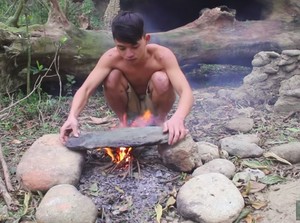 Keren! Begini Cara Primitif Masak Daging Tanpa Alat Dapur