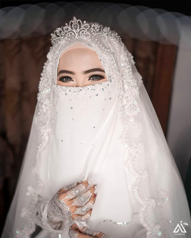  Tak hanya gaya hijab, Uni Alfi juga kerap membagikan kata-kata inspiratif di caption fotonya. Ia memotivasi diri dan orang lain untuk istiqomah bercadar. Foto: Instagram/UniAlfi