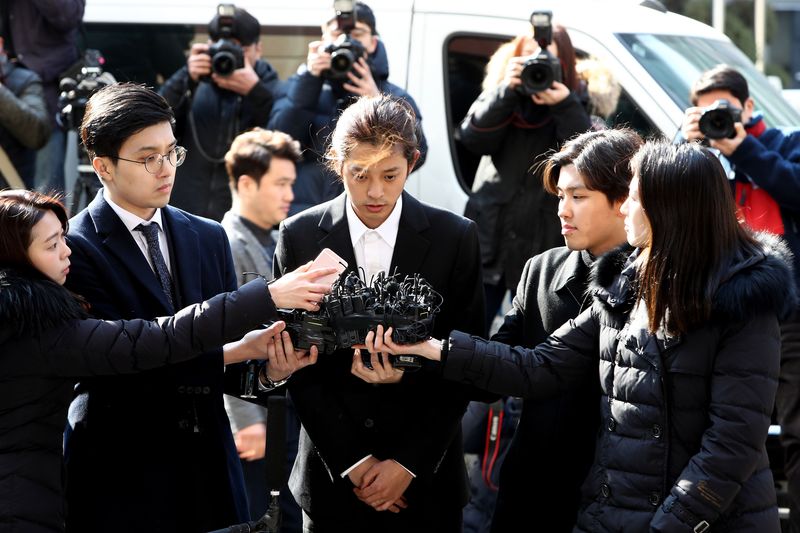SEOUL, SOUTH KOREA - MARCH 14: Singer Jung Joon-young is seen arriving at a Seoul Metropolitan Police Agency on March 14, 2019 in Seoul, South Korea.  Jung Joon-young, a South Korean singer-songwriter and TV celebrity appeared at the police station on Thursday to be questioned over suspicions of sharing sexual videos in a group chat which included BIGBANG's member Seungri, who is facing charges of supplying prostitution services.  (Photo by Chung Sung-Jun/Getty Images)