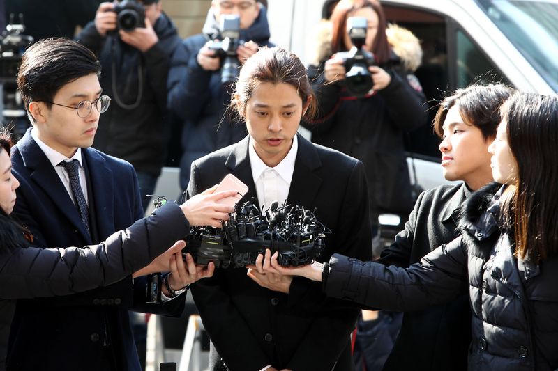 SEOUL, SOUTH KOREA - MARCH 14: Singer Jung Joon-young is seen arriving at a Seoul Metropolitan Police Agency on March 14, 2019 in Seoul, South Korea.  Jung Joon-young, a South Korean singer-songwriter and TV celebrity appeared at the police station on Thursday to be questioned over suspicions of sharing sexual videos in a group chat which included BIGBANG's member Seungri, who is facing charges of supplying prostitution services.  (Photo by Chung Sung-Jun/Getty Images)