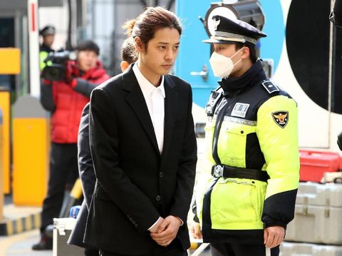 SEOUL, SOUTH KOREA - MARCH 14: Singer Jung Joon-young is seen arriving at a Seoul Metropolitan Police Agency on March 14, 2019 in Seoul, South Korea.  Jung Joon-young, a South Korean singer-songwriter and TV celebrity appeared at the police station on Thursday to be questioned over suspicions of sharing sexual videos in a group chat which included BIGBANG's member Seungri, who is facing charges of supplying prostitution services.  (Photo by Chung Sung-Jun/Getty Images)