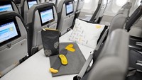 Secara teknis, sleeper seat merupakan fasilitas di kelas ekonomi berupa matras panjang yang dibuat di atas tiga bangku penumpang yang berada di bagian belakang pesawat (Thomas Cook)