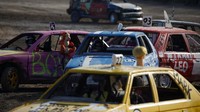 Mobil-mobil itu dicat warna-warni cerah dan banyak coretannya. REUTERS/Darrin Zammit Lupi.