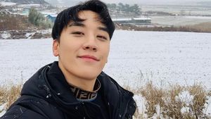 Gaya Liburan Seungri yang Terganjal Kasus Prostitusi