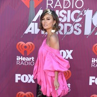 Agnez Mo datang ke acara penghargaan iHeartRadio Music Awards 2019 yang digelar di Microsoft Theater, Los Angeles, Amerika Serikat, Kamis (14/3/2019). Kehadirannya kali ini pun spesial karena Agnez memenangkan sebuah penghargaan. Foto: Getty Images