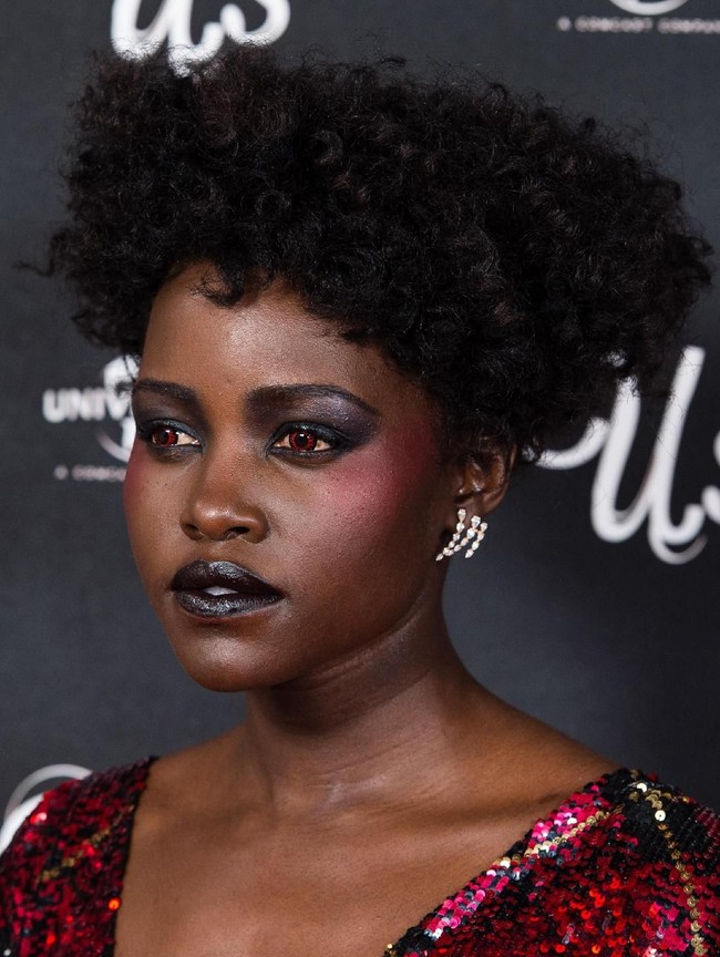 LONDON, ENGLAND - MARCH 14: Lupita Nyongo attends UK exclusive screening of 