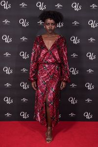 Tampil Beda, Lupita Nyong'o Bermata Merah di Premier Film