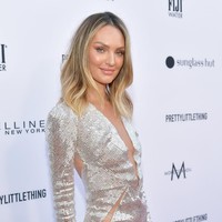 Candice merupakan salah satu model ternama Victoria’s Secret. Dia telah tampil dalam 14 peragaan busana merek tersebut dan resmi menjadi Angel pada 2010.  Foto: Neilson Barnard/Getty Images for Daily Front Row