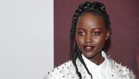 Lupita Nyongo saat menghadiri screening film Us di New York, AS pada Selasa (19/3) waktu setempat. Jamie McCarthy/Getty Images