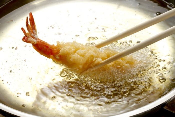 Fried shrimp ball or Tempura Shrimps in wood plate on the table