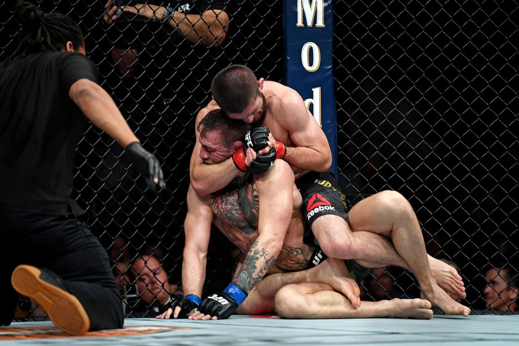 FILE PHOTO: Oct 6, 2018; Las Vegas, NV, USA; Khabib Nurmagomedov (red gloves) fights Conor McGregor (blue gloves) during UFC 229 at T-Mobile Arena. Mandatory Credit: Stephen R. Sylvanie-USA TODAY Sports/File Photo