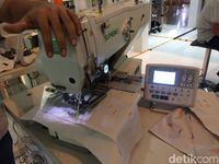 Mesin Canggih Ini Bisa Buat Lubang Kancing Dalam Waktu 10 Detik