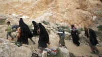 Mereka sebelumnya berada di Baghuz, kantong terakhir kelompok ISIS, yang direbut oleh Pasukan Demokratis Suriah, SDF pimpinan suku Kurdi. REUTERS/Issam Abdallah.