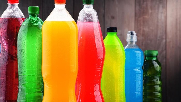 Cans of soft drink. Cooling frozen and with water drops