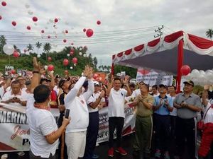 Gubernur Olly Kampanye Pemilu Rukun Tanpa Golput Lewat Jalan Sehat