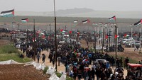 Aksi itu dilakukan di sejumlah titik di sepanjang perbatasan Gaza-Israel. Mohammed Salem/Reuters.