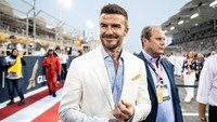 Kehadiran Beckham di ajang balapan mobil itu disambut meriah oleh penonton yang hadir di Bahrain International Circuit. Lars Baron/Getty Images.
