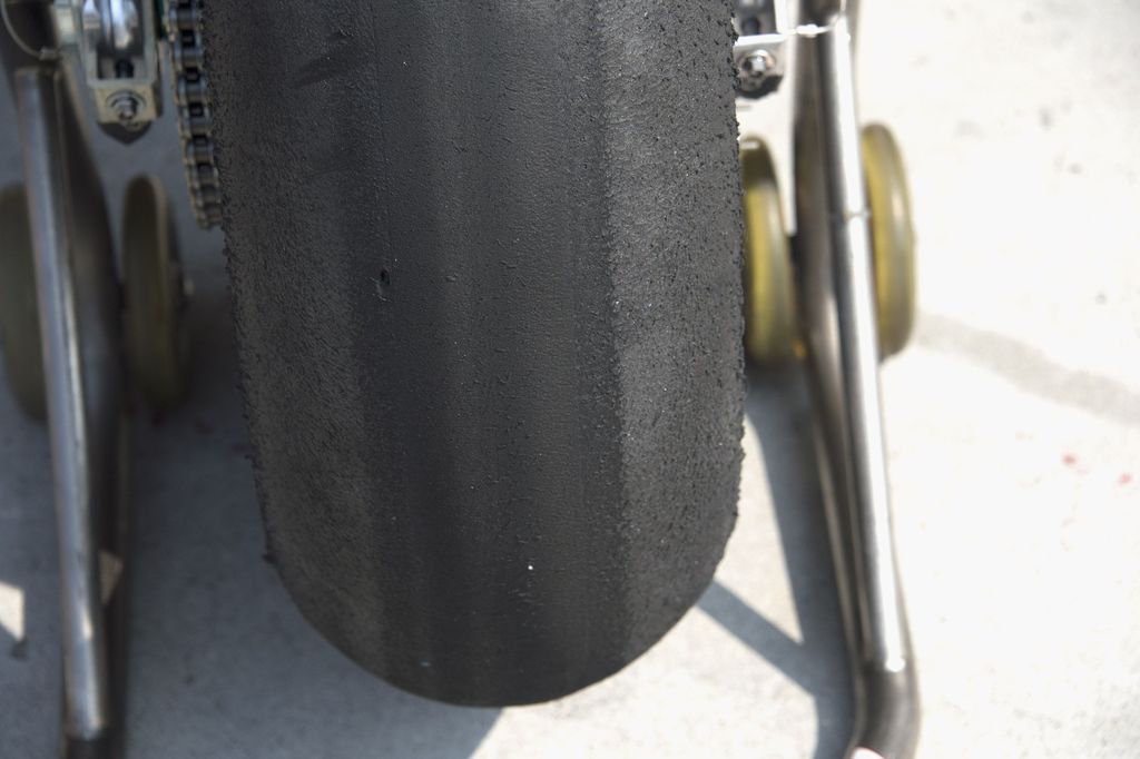 NORTHAMPTON, ENGLAND - AUGUST 26:  Jack Miller of Australia and Alma Pramac Racing jokes with soft tyre in box waiting the start of the MotoGP race during the MotoGp Of Great Britain - Race at Silverstone Circuit on August 26, 2018 in Northampton, England.  (Photo by Mirco Lazzari gp/Getty Images)