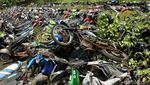 Potret Pemakaman Bangkai Motor Hasil Sitaan Polisi