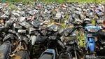 Potret Pemakaman Bangkai Motor Hasil Sitaan Polisi